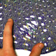 Illustration for article titled Making A Case For Intentional Stitch Glitches And Holey Knits